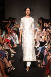 Sanjay Garg white sherwani style suit for women