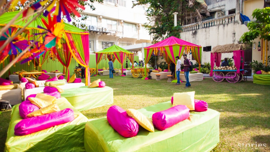 Colourful pink and green mehendi decor for day wedding Shonan & Adesh