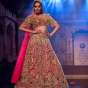 Abu Jani Sandeep Khosla - Heavily Embroidered Pink Lehenga and Blouse with Gold Work - Sonam Kapoor - BMW India Bridal Fashion Week 2015